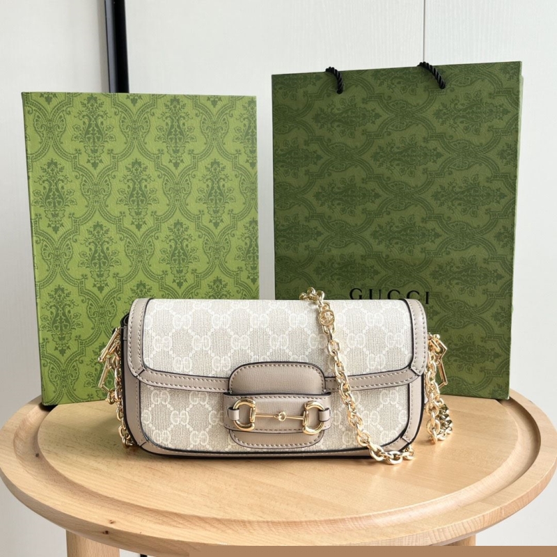 G*u*i satchel bags